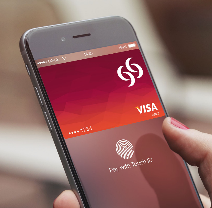 Commercial Bank Visa debit card in a mobile wallet being authorised with a fingerprint