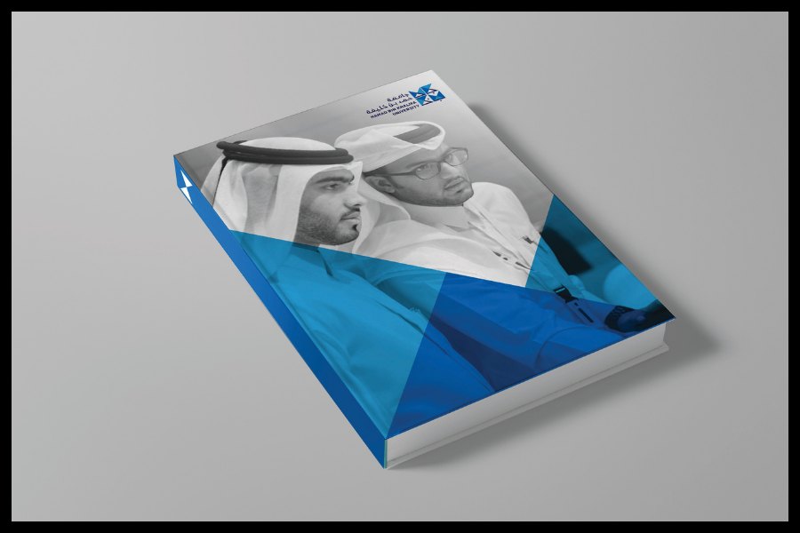 HBKU brand applied across printed materials