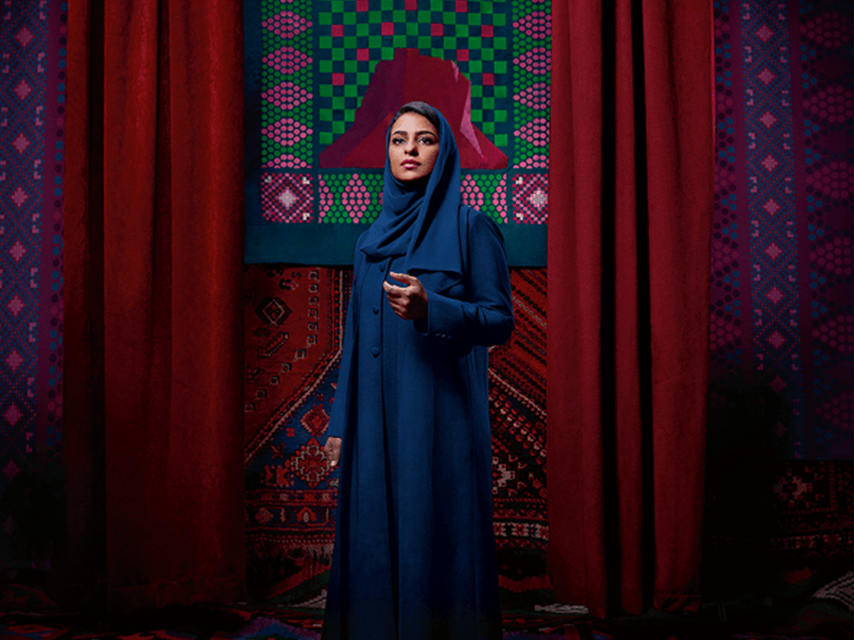 Campaign visual for Ambition, magenta reinterpretation of Tuwaiq Mountain